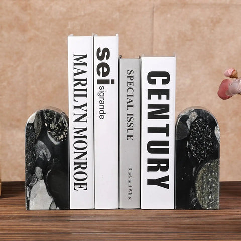 Sturdy Marble Book Ends Set Weighing 7lbs With Non Slip Pads for Stable Shelf Display holding books upright on a shelf