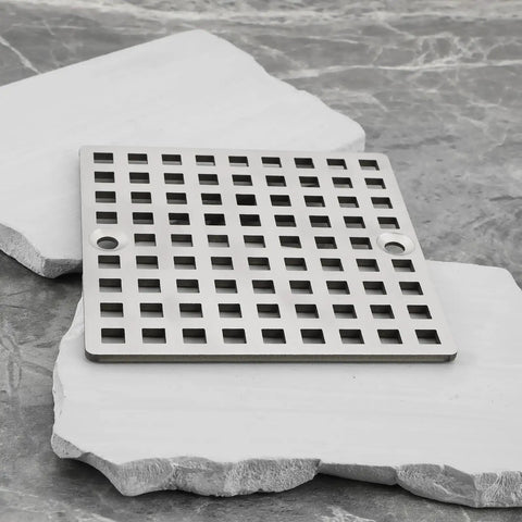 4 Inch Square Shower Drain Cover Crafted From Brushed 304 Stainless Steel for heavy usage, featuring a grid strainer design.