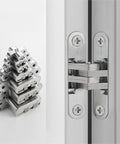 Badass Stainless Steel Hidden Door Hinges With Invisible Concealed Pivot For Cabinet Furniture Hardware Hella Rustproof And Keeping Your Doors Swinging Nice And Tight All Day Long 34X140MM stacked and mounted on a door.