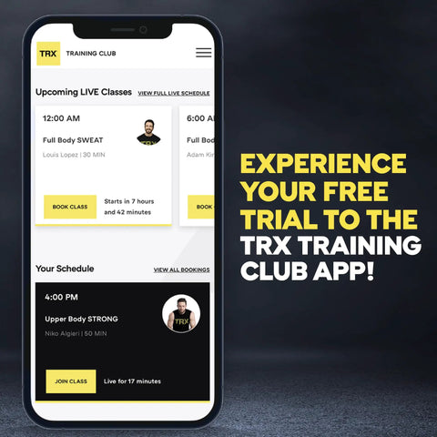 Mobile phone displaying TRX Training Club app schedule for upcoming live fitness classes and user information.