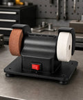 Top Shelf Twin Wheel Bench Grinder With Straightforward Rocker Switch Heavy Duty Electric Edger featuring compact steel design and two wheels.