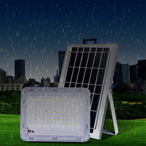 Heavy Duty Double Head Solar Flood Lighting With Remote And IP67 Waterproof Shield for outdoor use in rainy weather.