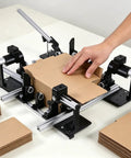 Super Adjustable Manual Box Folding Aid For Shipping Cardboard Containers Hassle Free Easy Pack Tool With Smooth Slider Mechanism Fits All Standard Sizes Package Like A Pro Effortlessly in use, folding a cardboard box.