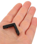 Level Up Your Build With These Sick L-Shape Interior Corner Connectors For 2020 T-Slot Aluminum Profiles in hand, showcasing size and material.