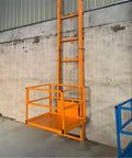 Robust Heavy Duty Vertical Freight Elevator Built Tough For Warehouse And Home Use Massive Cargo Platform in orange with frame.