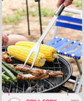 Person using stainless steel grill fork from Stainless Steel Grill Tool Set With Chef Spatula Tongs And Fork Outdoor Barbecue Utensils Kit on grill.