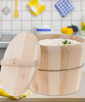 Handmade Wooden Rice Steamer Bucket With Flat Lid And Detachable Base For Commercial Kitchen Use filled with rice on a kitchen countertop.