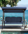 Three Seat Outdoor Porch Swing With Upgraded One And A Half Inch Cup Holder Comfy Adjustable Canopy And Backrest Cushions Weatherproof Steel Frame For Garden Deck Or Poolside Blue by the sea