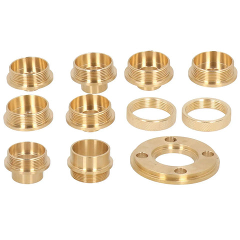 Solid Brass Router Template Guide Set 11 Piece Knockout Kit Includes Eight Sized Bushings two lock nuts and adapter close-up view of brass bushings.