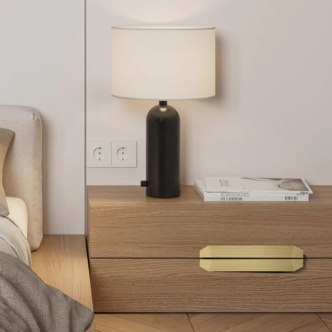 Brushed Gold Cabinet Pulls 9.75 Inch Polygon Drawer Handles on wooden dresser, modern bedroom setting