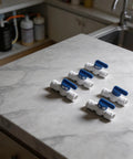 5 Pack 3 8 Inch Push In Ball Valve Quick Connect Plumbing Fitting Leak Proof Polypropylene on a marble surface.