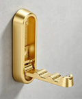 Space Saving Folding Wall Coat Hooks With Screws Pretty Sleek Copper Finish Heavy Duty Concealed Design mounted on wall.