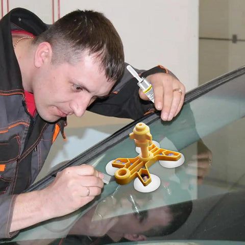 Man using Windshield Chip Repair Kit for Quick Fix and Crack Stop Auto Glass Repair Tool on car windshield