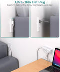 Slim Flat Plug Extension Cord With Six Outlets And Right Angle Design Gonna Save You Serious Space Behind Sofas Beds Or Fridges Perfect For Dorms Tiny Spots Keeps Your Gear Running Butter Smooth All Day Long, shown fitting snugly behind sofa.