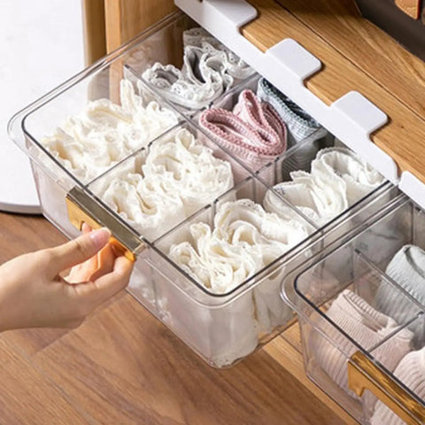 Adhesive Hanging Closet Rod Rack With Extra Sock And Underwear Dividers Straight Up keeps socks organized in clear drawer with gold handle.