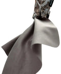 Angled front view of SPUDZ Ultra Microfiber Lens Cleaner with camo closable pouch and clip, 6x6 inch tan cloth