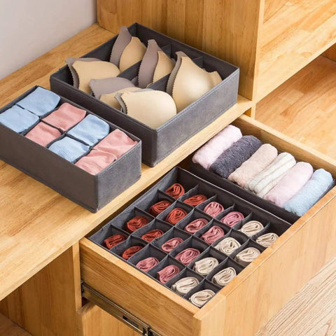 4 Piece Foldable Fabric Drawer Organizer Set For Socks And Underwear Storage Using A Nifty Layout To Keep Your Closet Clean, displaying organized socks and bras.