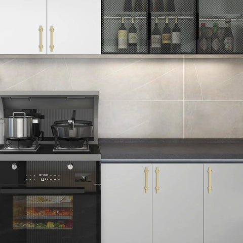 10 Pack 5 Inch Brushed Gold Cabinet Handles Premium Aluminum Zinc Alloy Hella Sleek Hardware Smooth Glide Action For Kitchen Cupboards Closets And Drawers installed on modern kitchen cabinets.