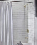 Elmhurst Shower Trim Kit With Tub Spout In Brushed Nickel Finish installed in modern bathroom with white tile and shower curtain