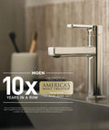 Sleek chrome kitchen faucet with straight spout, modern design, adjacent to countertop and backsplash, Moen branding present