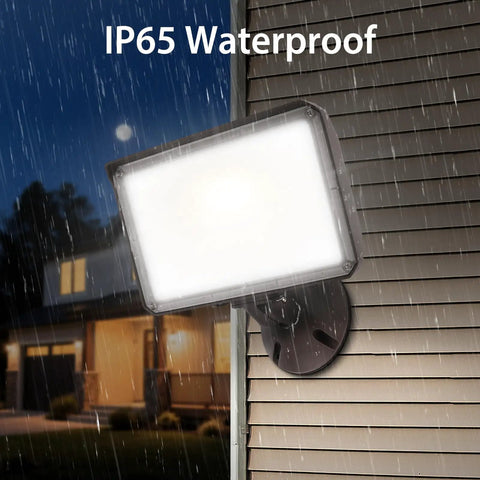 Heavy Duty 100W LED Flood Light Outdoor Security Spotlight 5000K Daylight 14200 Lumens IP65 Weatherproof mounted on a wall.