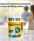 No Sweat At Home Bacteria Water Test Kit For Safe Drinking Water Screening with a glass of water in background.
