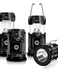 4 Pack Solar Camping Lanterns Collapsible Led Lantern And Flashlight USB Rechargeable Emergency Lights For Camping Power Outages Indoor Outdoor 360 Degree Illumination All In One Go To Modern Black, showing four black lanterns with handles.