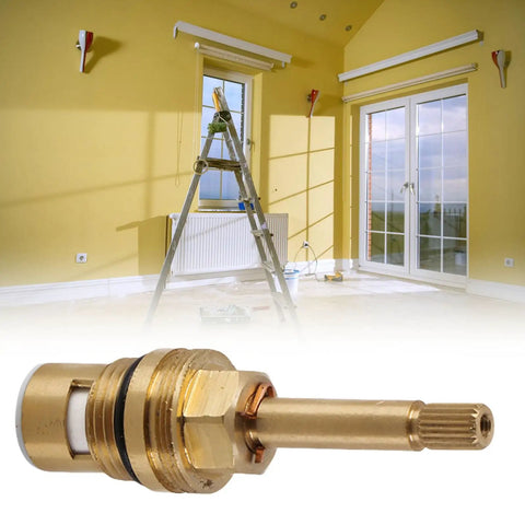 Built Like A Tank Brass Faucet Cartridge With Ceramic Valve Cores For No Nonsense Plumbing Repairs Heat Resistant And Smooth Glide Reliability in focus against a yellow room backdrop.