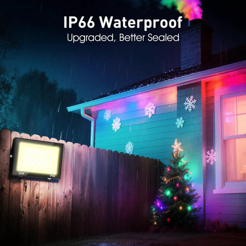 Rock Solid 50W RGB LED Flood Light With Hella Bright 5000 Lumens And IP66 Waterproof Rating, mounted on a fence illuminating a festive landscape.