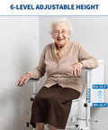 Senior woman seated on Built Tough Toilet Safety Rails For Seniors With No Wobble Stability And Wide Anti Slip Base For Tile Or Hardwood Floors Straightforward Setup Handicap Support Frame with adjustable height.