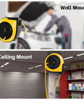 Heavy Duty Retractable Extension Cord Reel Rolls Up Crisp Saves Floor Space Delivers Serious Muscle For Garage Or Shop With 75 Foot 14 Gauge Cable mounted on wall and ceiling.