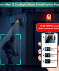 Wireless Outdoor Security Camera System With 2K HD Video And Battery Power in use, detecting motion at night with spotlight and siren alarm.