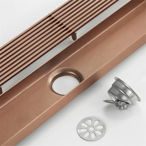 Rock Solid Stainless Steel Rectangle Floor Drain Cover With Removable Grate And Slick Hair Catcher For Bathroom Shower Tile Quick Drainage Anti C Logging Filter No Hassle Cleanup And Super Fast Flow with copper finish and removable parts.