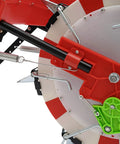 Close-up of Precise Hand Push Garden Seeder with Seven Nozzles, showing iron and plastic build, spring mechanism detail.