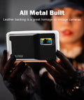 Close-up of a person holding the On Camera RGB LED Light With 6000mAh Battery, App Control Via Bluetooth, All Metal Portable Video Lighting Panel For Filming And Photo Shoots, Retro 08X, 8 Hour Battery Life At 50 Percent Brightness, showing leather back and display screen.