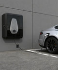 Hella Rugged EV Charger Enclosure For Tesla Wall Connector And Most Electric Cars Galvanized Steel Wall Box mounted on wall with car charging.