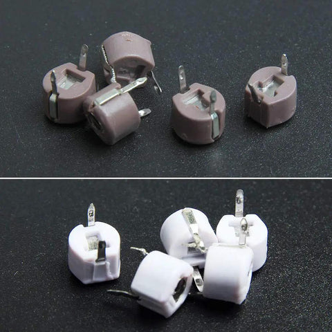 Awesome 45 Piece 6Mm Trimmer Capacitor Kit Featuring Nine Separate Values For Quick Radio Circuit Adjustments And Totally Hassle Free Weekend DIY Repair. Brown and white trimmer capacitors with lead pins, suitable for electronics projects.