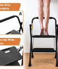Heavy Duty 2 Step Folding Ladder With 500 Lb Capacity Anti Slip Wide Pedals Beefy Steel Frame Secure Lock Buckle Handy Handgrip