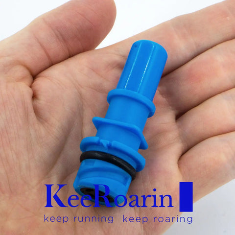 Heavy Hitter Evaporative Emission Control Valve PCV Valve in hand, blue plastic with rubber O-ring, for Ford vehicles.