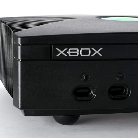 Close up of X80X gaming console showing ports and sleek black design, part of the High Grade Silicone Audio Isolation Bumpers Four Pack.