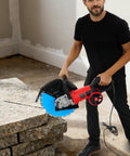 Heavy Duty Electric Concrete Cutter With 13 Inch Diamond Blade And Rolling Stand 4000W in action on granite blocks.