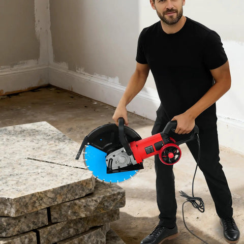 Heavy Duty Electric Concrete Cutter With 13 Inch Diamond Blade And Rolling Stand 4000W in action on granite blocks.