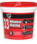 Ready To Use White Window Glazing Compound 32 Oz Tube in a red and white container for sealing wood, metal, aluminum sashes.