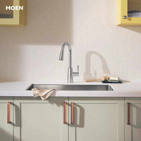 Pulldown Kitchen Faucet With Power Clean Spray And Reflex Docking System For Easy Docking, Smooth Operation, And Powerful Cleaning, One Handle Modern Sink Faucet 7402C in a modern kitchen setup.