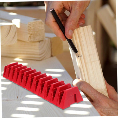 Red 12 Piece Modular Wrench Organizer Tray on workbench with hand marking wood, plastic construction, durable, quick access.