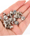 Built Tough Chicago Style Binding Screws For Books And Scrapbooks And Paper Crafts Using 75 Piece Silver Carbon Steel Fasteners in hand.