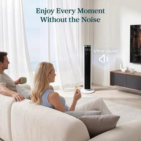 Couple relaxing in living room with Ultra Quiet Tower Fan For Bedroom That Blows Fresh Cold Air With Rapid 28 Ft S Airflow And Wide Oscillation.