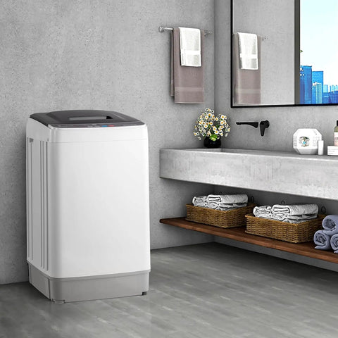 Fully Automatic Portable Washing Machine With Built In Drain Pump And Hands Free Spin Cycle in modern bathroom setting.
