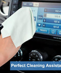 Close-up of light-colored microfiber cleaning cloth (6x7 in) cleaning a car infotainment touchscreen