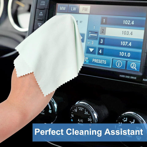 Close-up of light-colored microfiber cleaning cloth (6x7 in) cleaning a car infotainment touchscreen
